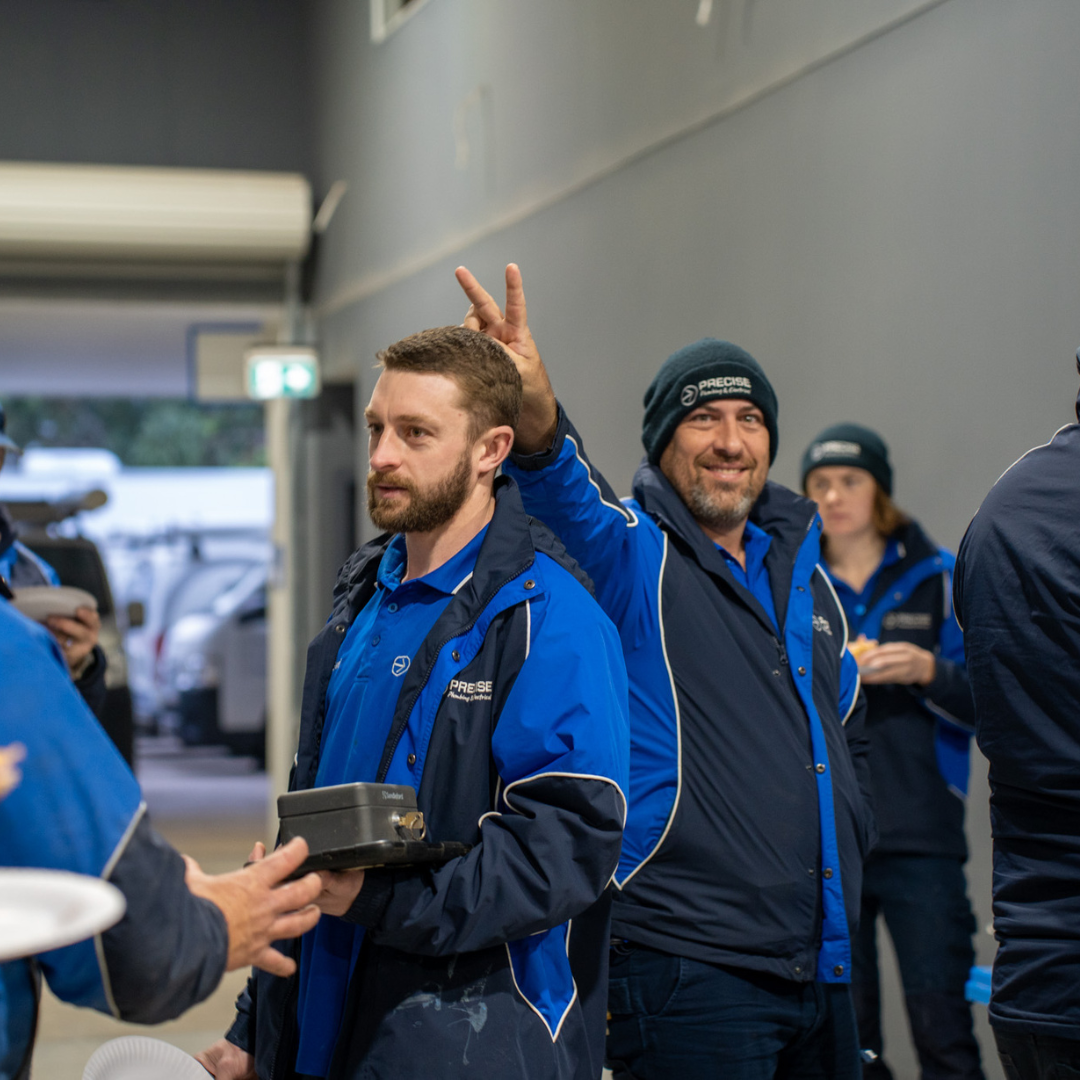 Team members sharing a laugh