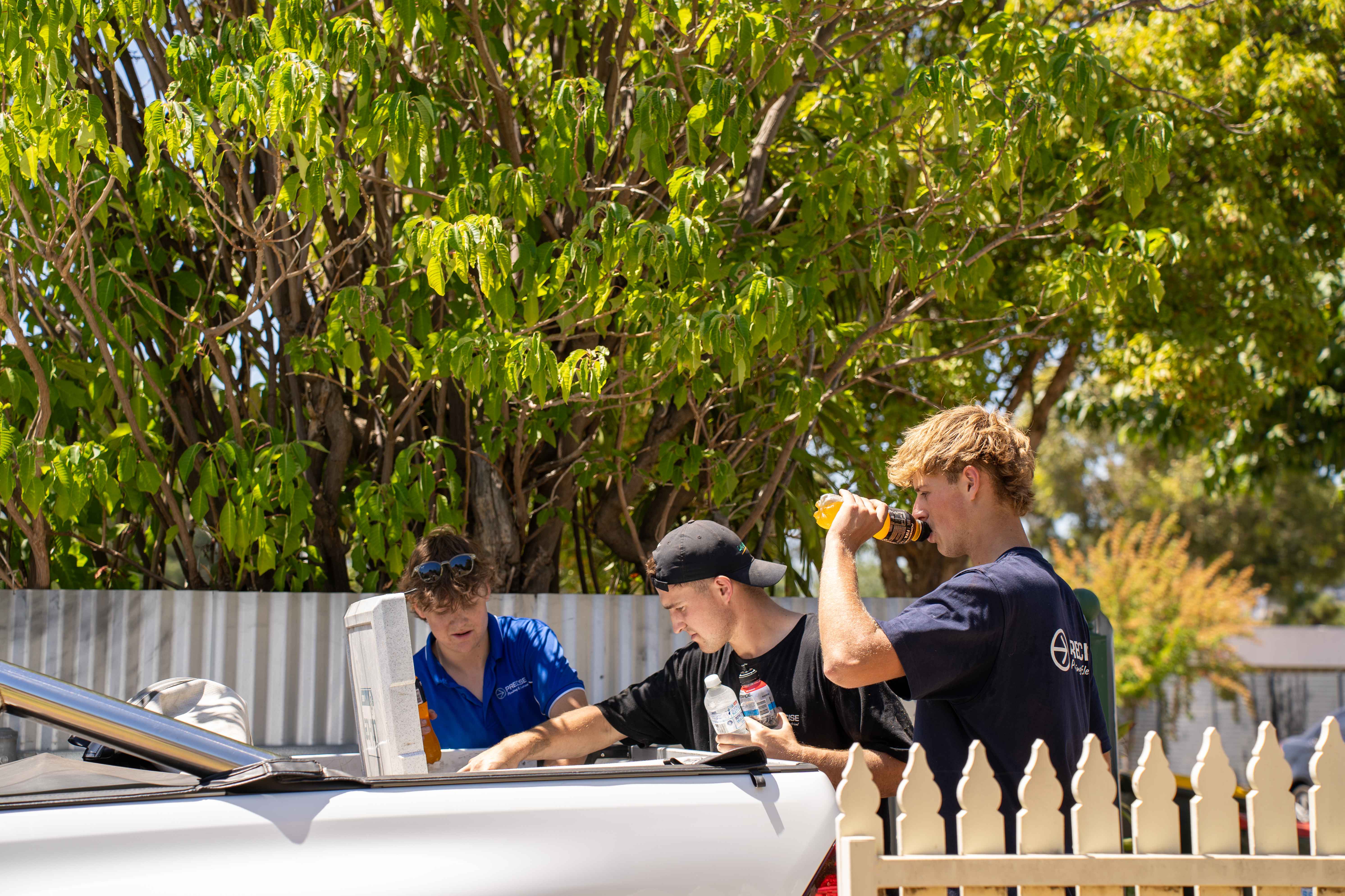 Young apprentices taking a break on a sunny day